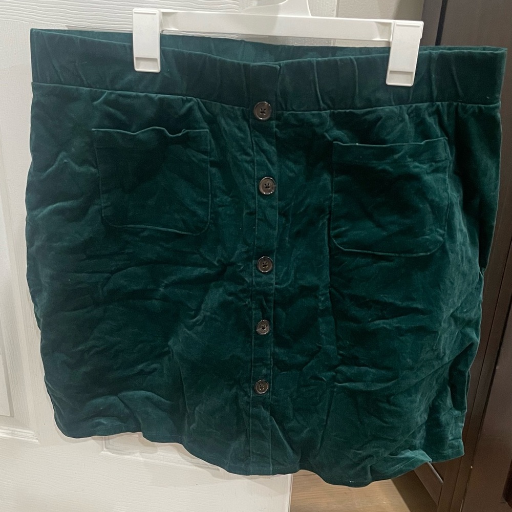 Forest green corduroy skirt with button detail